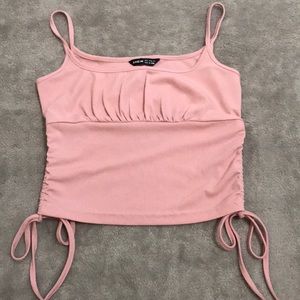 Pink tank top with ruched sides